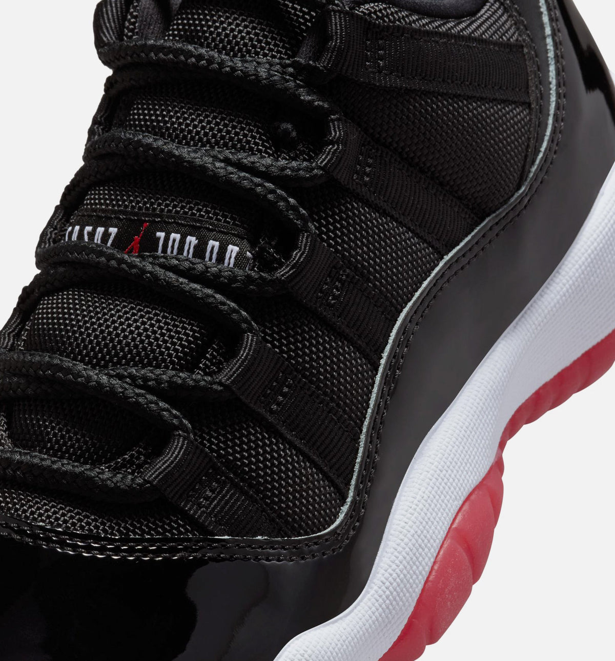 Air Jordan 11 Retro Bred Grade School Lifestyle Shoes | Black / Varsity Red / White